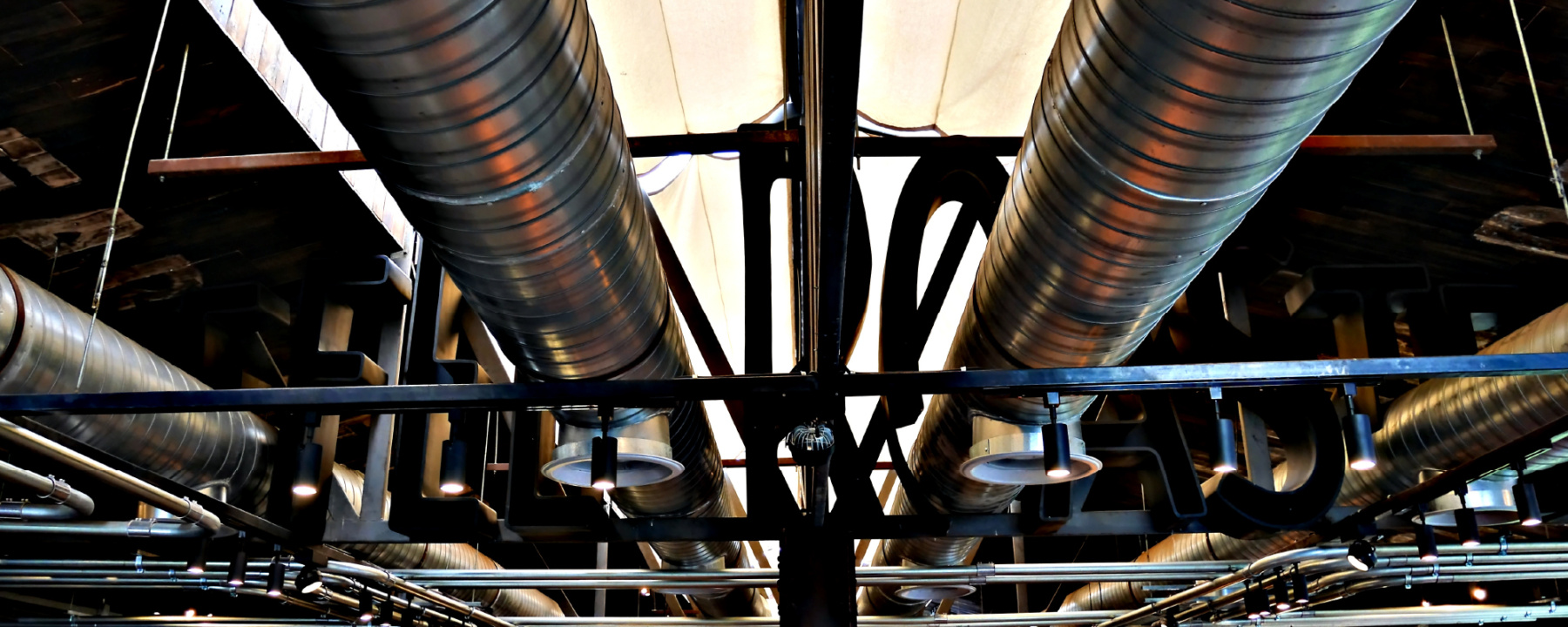 Image of ductwork piping system and ventilation pipes of air condition install on building structure