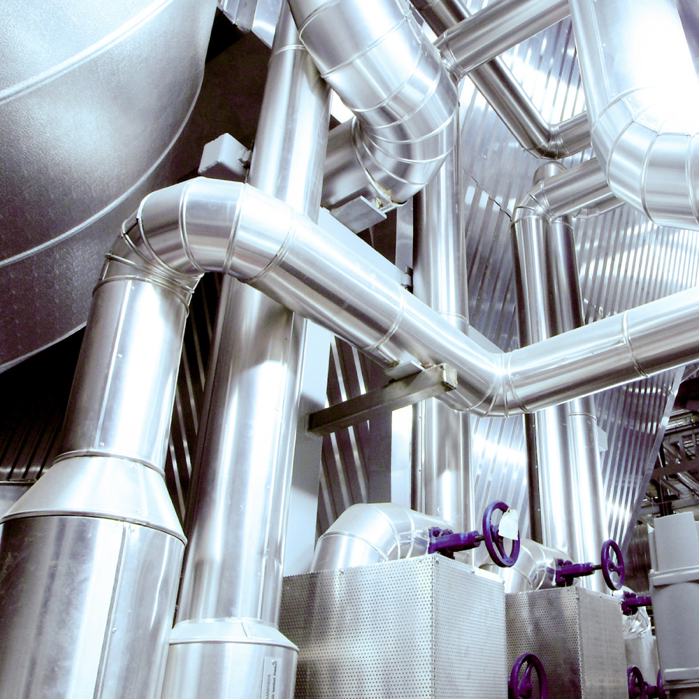 Cables and piping found inside a modern industrial power plant