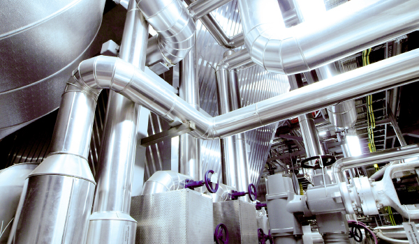 Cables and piping found inside a modern industrial power plant