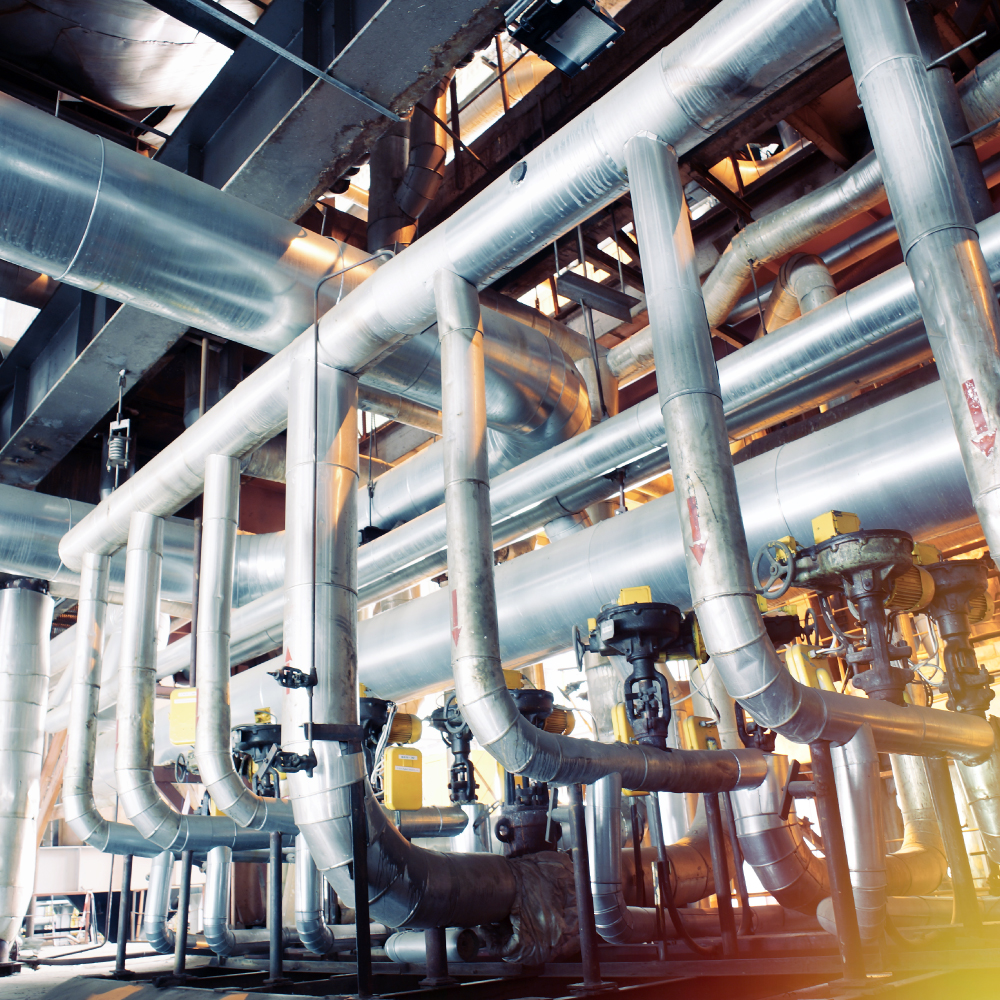 Cables and piping found inside a modern industrial power plant