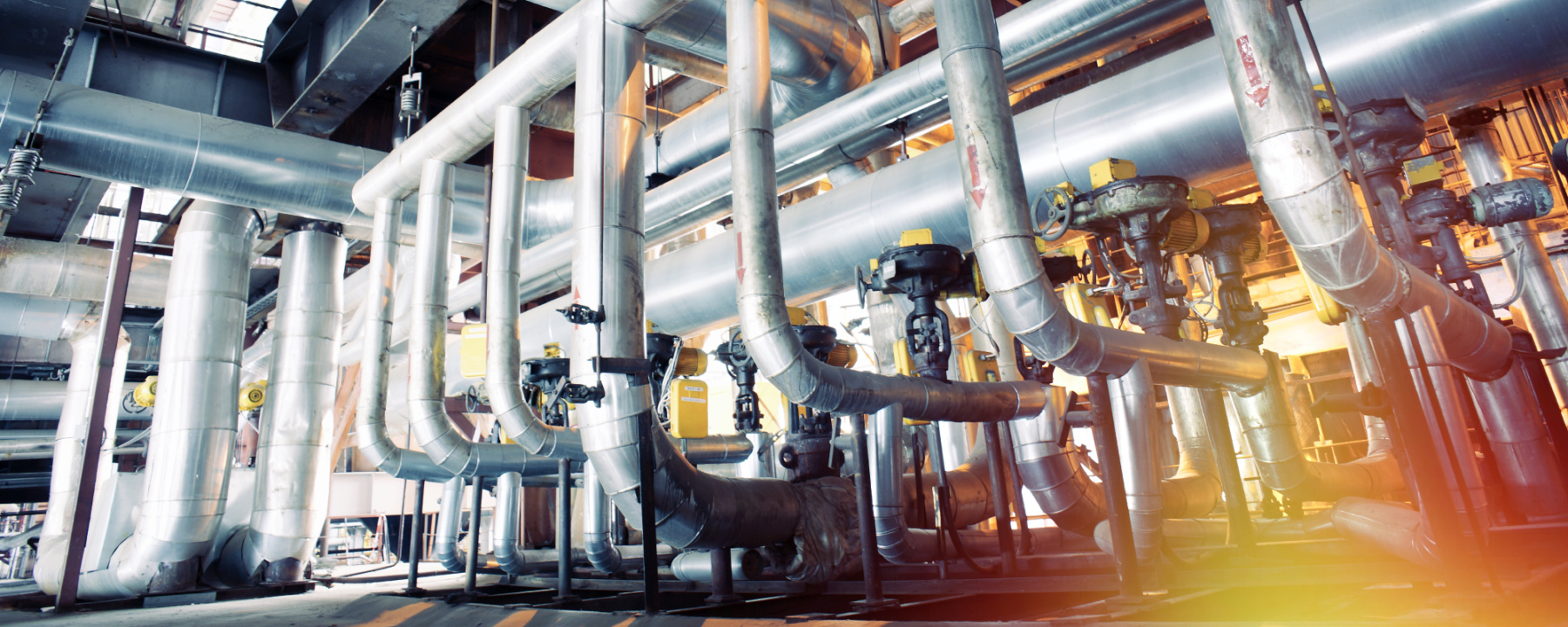 Cables and piping found inside a modern industrial power plant
