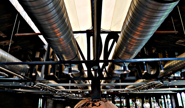 Image of ductwork piping system and ventilation pipes of air condition install on building structure