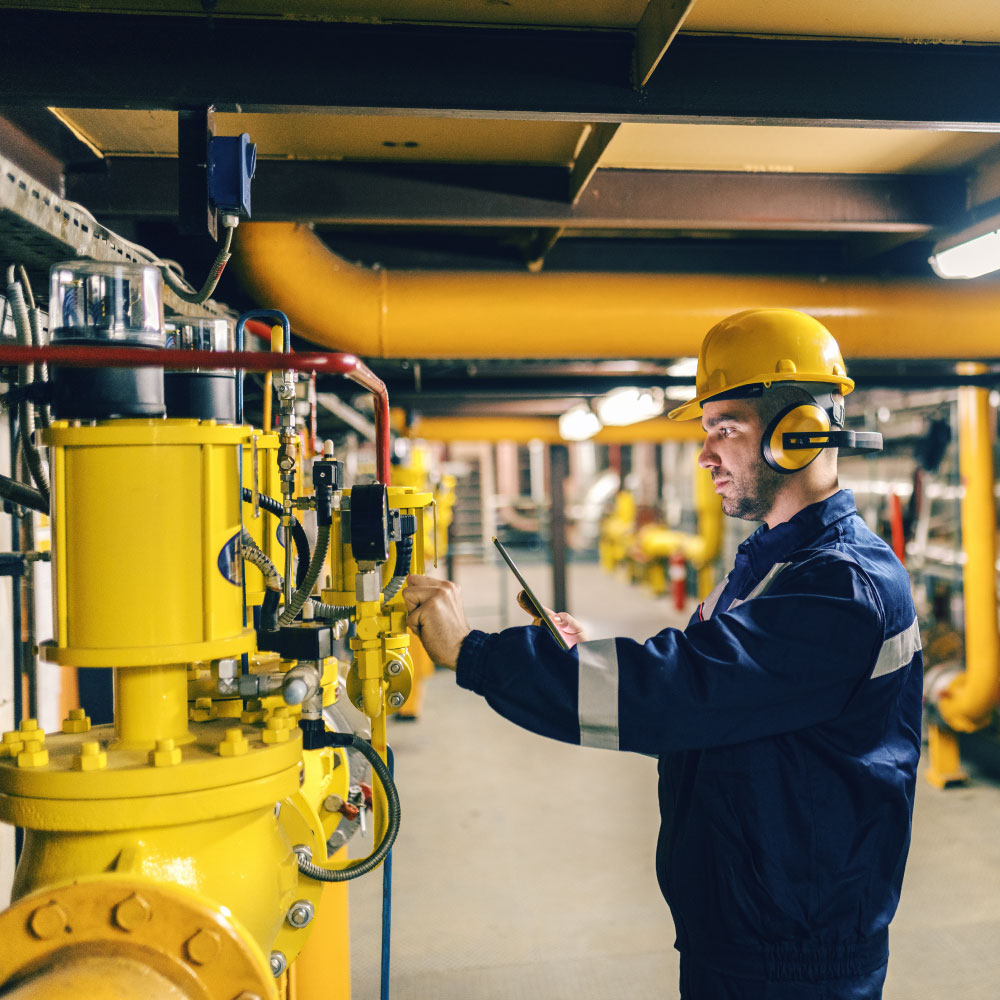 Engineer analysing heat network.