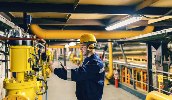 Engineer analysing heat network.
